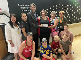 Servus Credit Union Presents $10,000 Donation